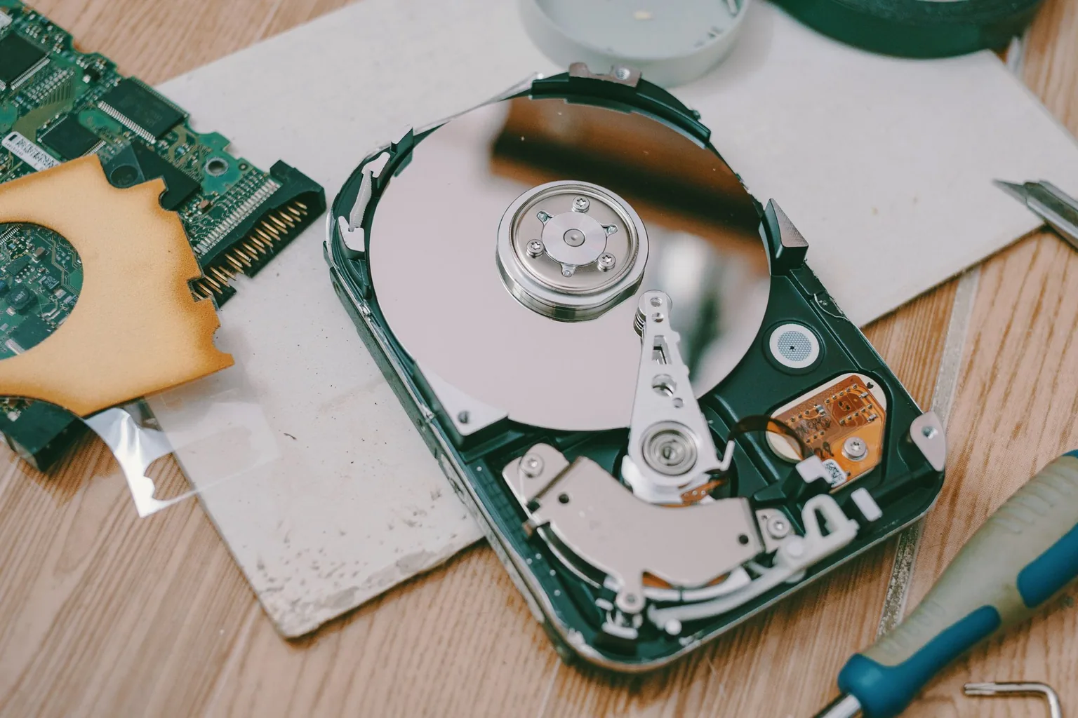 Opened hard drive ready for secure data destruction before recycling