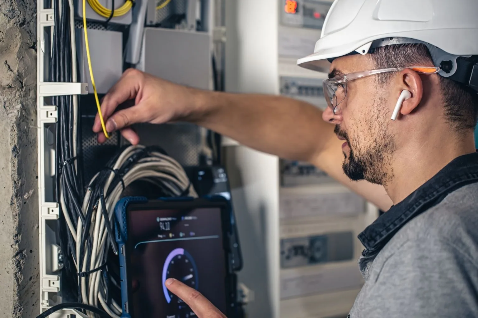 Technician installing and configuring a business network in Greensboro, NC