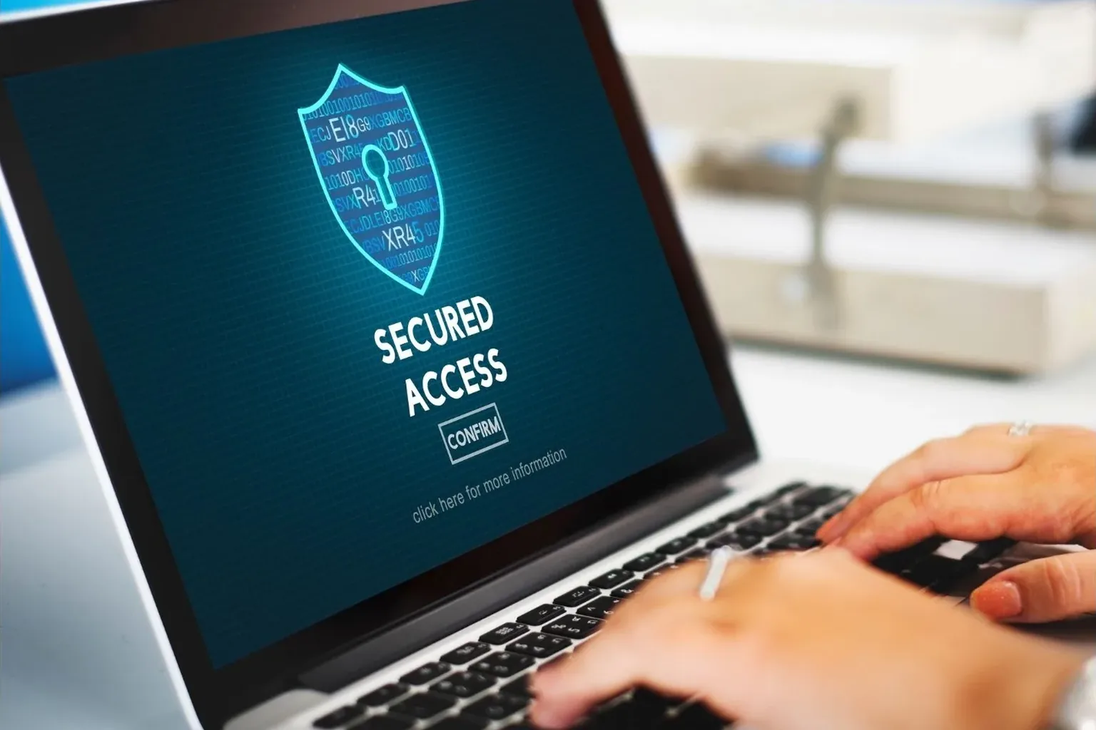 Technician removing malware and reviewing a security warning in Greensboro, NC